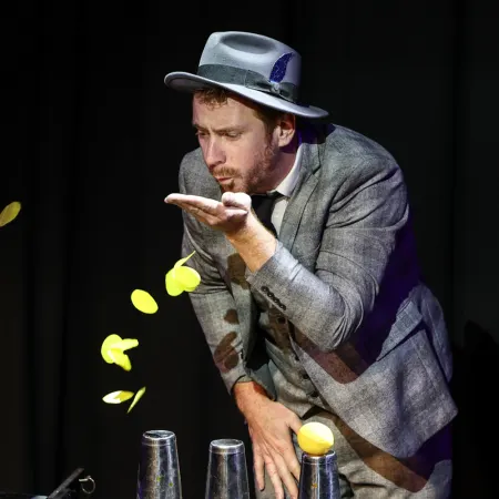 A magician for kids in a show of Magic World